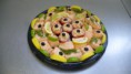 Saumon poêlé, tomate farcie avec une macédoine