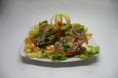 Langue et oreille de porc à la salade